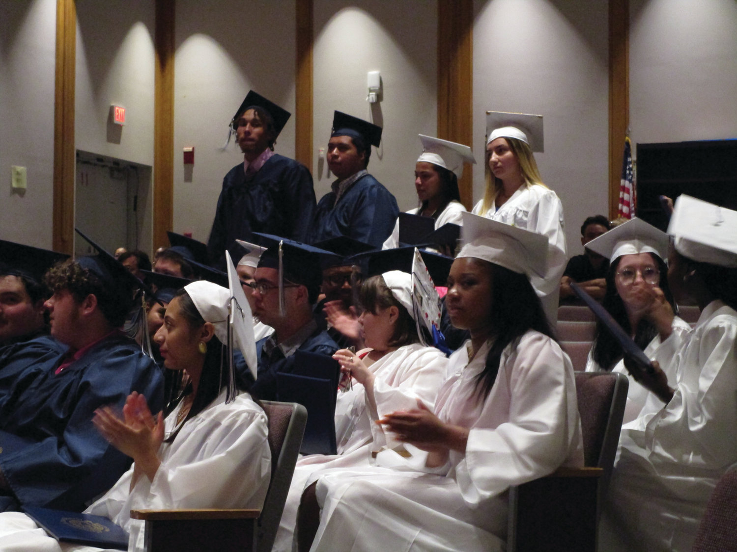 REASON TO CHEER: NEL/CPS Construction & Career Academy graduates cheer on their fellow classmates during the ceremony.